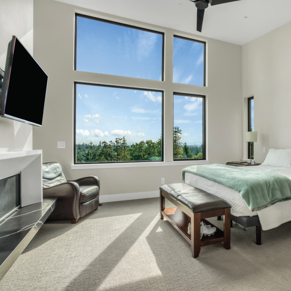 View into a bedroom with asymmetrical windows to capture the view built by Mike Riddle Construction View into a bedroom with asymmetrical windows to capture the view built by Mike Riddle Construction